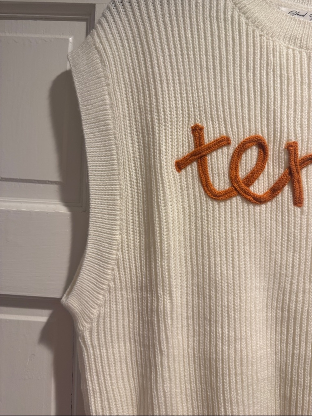 Sleeveless Crewneck Knit Sweater in Cream with Orange Script - Picture 3 of 6